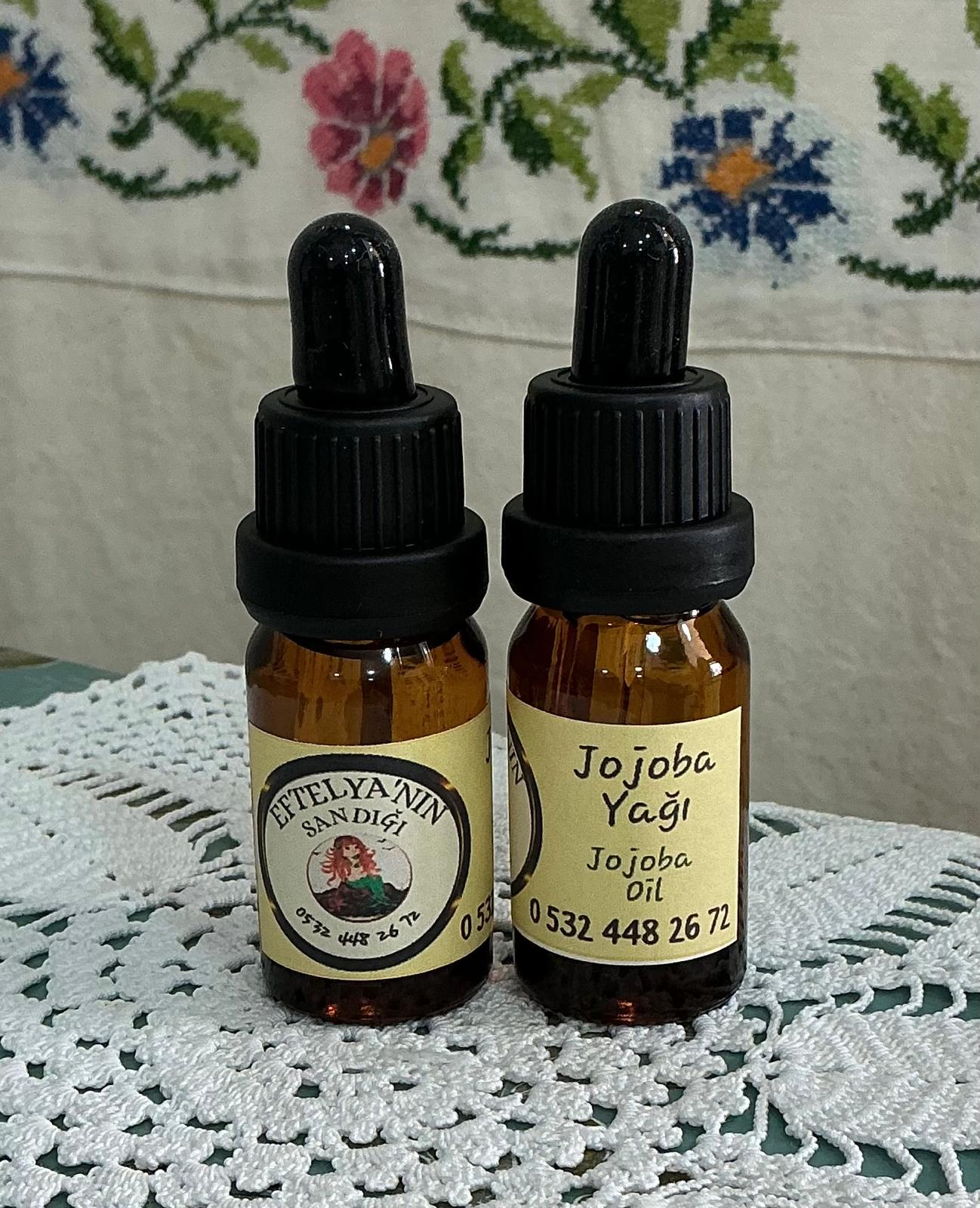 eftelyanin-sandigi-saf-dogal-jojoba-yagi-damlalikli-sise